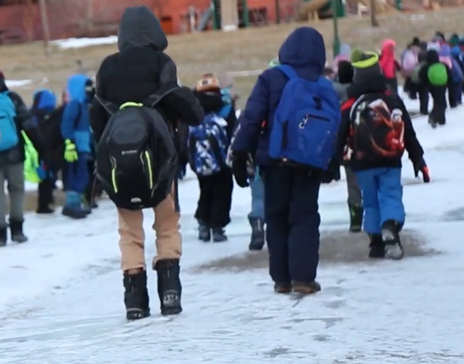 Kids walking to school in winter